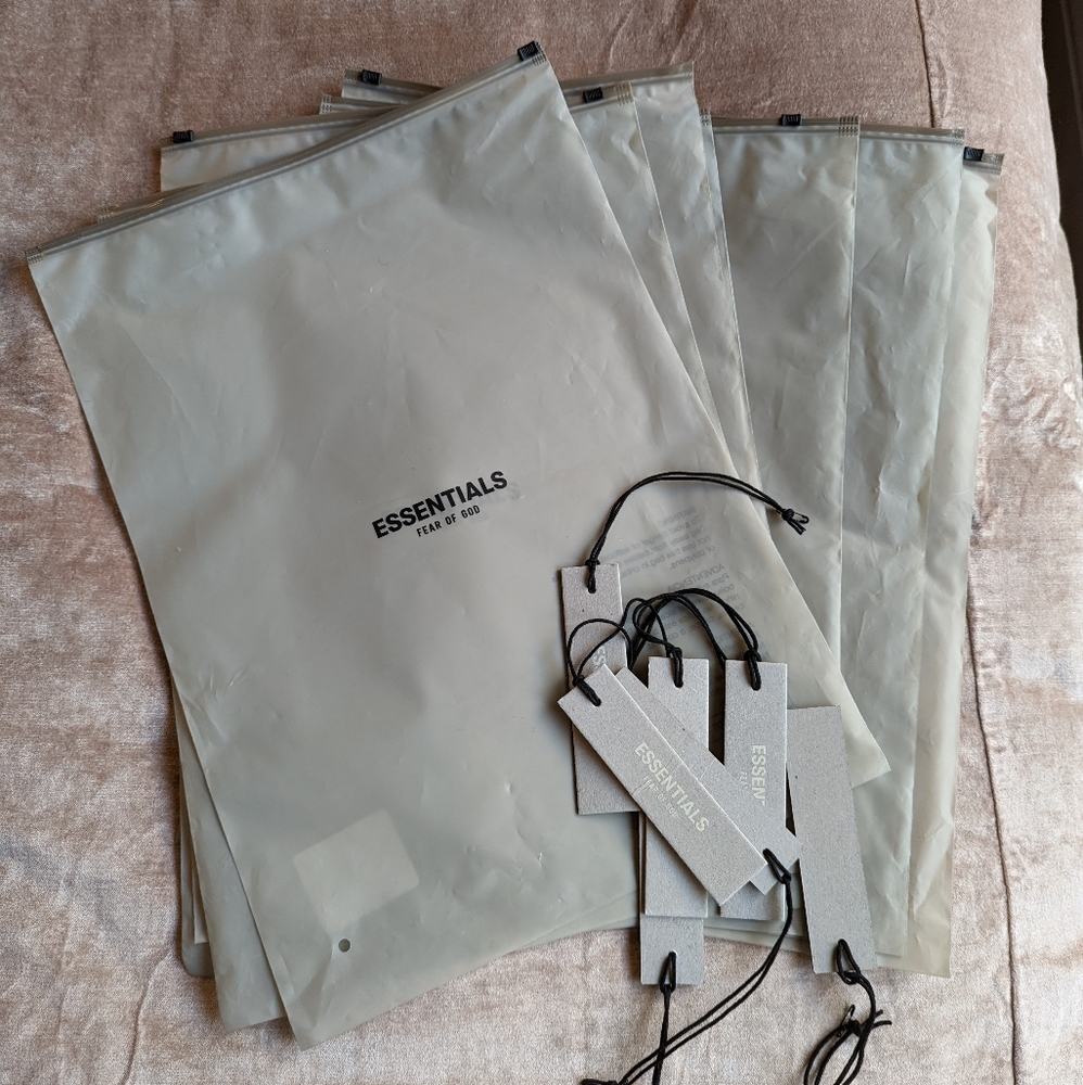 Fear of God Essentials bags and tags